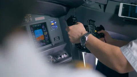 A pilot turns the steering wheel, close up. Stock Footage 88539585