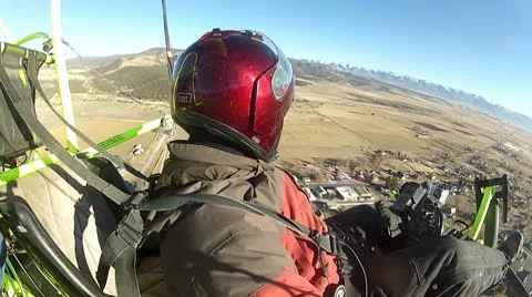 Pilot ultralight aircraft over rural town aerial shot  P HD 034-2 Stock Footage 10609934