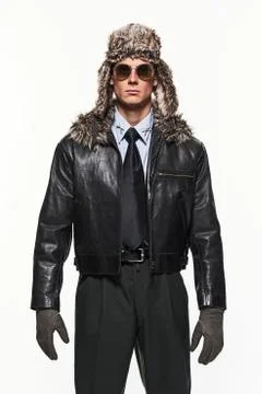 Pilot uniform fashion man against white background. Stock Photos