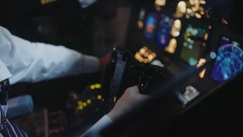 Pilot Using Flight Pilotage Equipment in Airplane Cockpit for Piloting Aviator Stock Footage 259049916