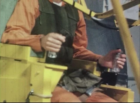 Pilot using joystick of Multi-Axis Space Test Facility during simulated flight Stock Footage 262445132