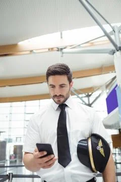 Pilot using mobile phone Foto stock