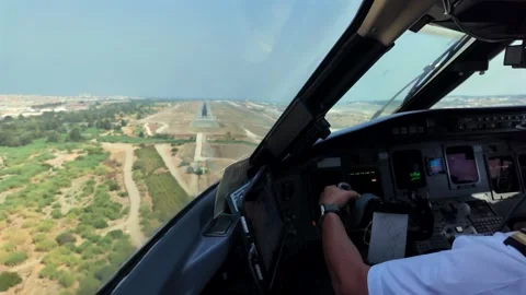 PIlot View in a Real Time Approach to Malaga Airport in a Sunny Summer Day. Stock Footage 345621505