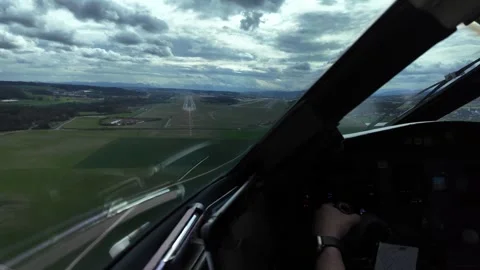 Pilot View Through Cockpit Window of a Real Final Approach to Runway 14 with a Stock Footage 334146746