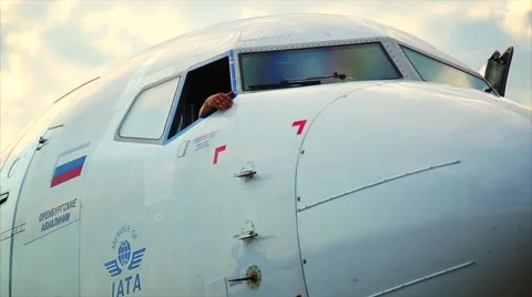 Pilot waving from the cockpit Stock Footage 53867071