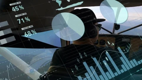 Pilot wearing cap and headset monitoring cockpit flight data overlays fading in Video stock 319682169