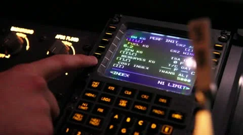Pilot working on FMS computer Stock-Footage 21632715