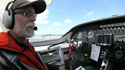 Pilot working through check list of a rv6 Stock Footage 13597366