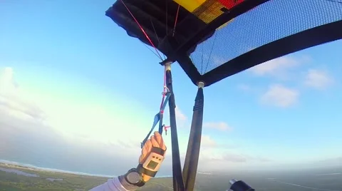 Piloting the parachute, flight above the ocean, subjective camera. Stock Footage 46012460