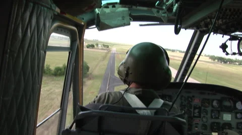 Pilots converse during helicopter flight Stock Footage 41061480