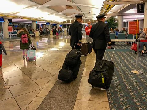 Pilots in a Delta gate preparing to fly out to their destination at the Orlan Stock Photos
