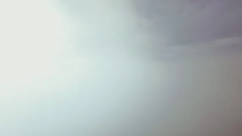 Pilot’s Eye View Descending Through Endless Layers of Ethjereal Clouds Under a Stock Footage 320570045