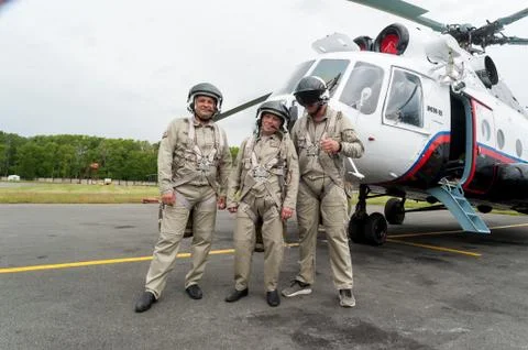 Pilots before flight in front of MI-8 helicopter Stock Photos