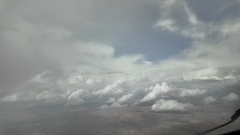 A Pilot’s FPV: Flying Through a Storm Cloud with Rain Showers, and Emerging Stock Footage 309205348