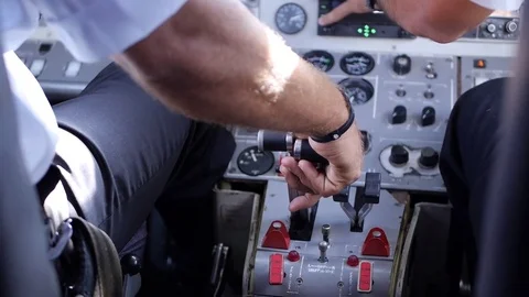 The pilot's hands in a cabin of the plane Video stock 77451425