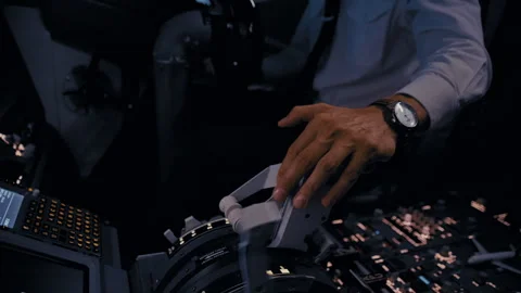 Pilot's Hands on the Thrust Levers for Landing Video stock 326179987