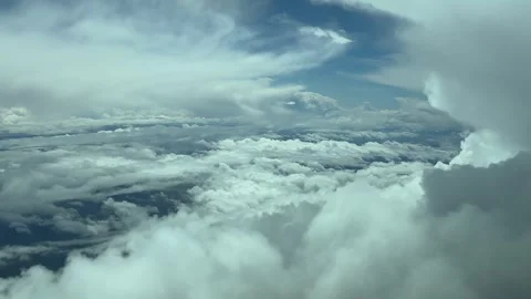 A Pilot’s Perspective: Dramatic Aerial Flight Through Massive Storm Clouds at Stock Footage 306579657
