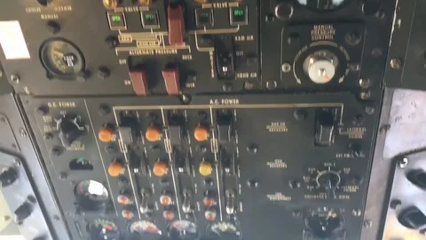 Pilots prepare flight controls inside aircraft cockpit Stock Footage 110794479