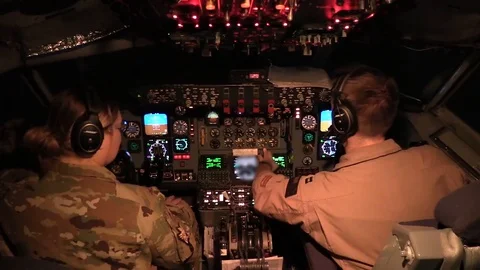 Pilots prepare flight controls inside aircraft cockpit Stock Footage 114083775