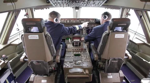 Pilots preparing for takeoff Stock Footage 62063688