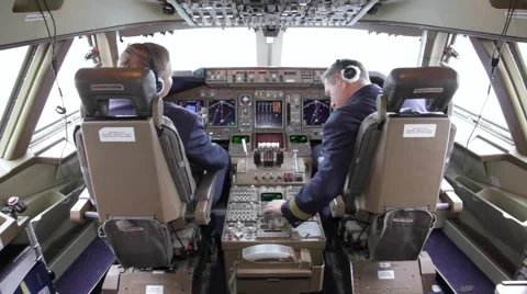 Pilots preparing for takeoff Stock Footage 62063887