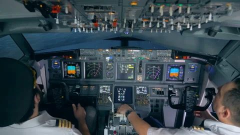 Pilots sit in a flight simuator, close up. Stock Footage 88539822