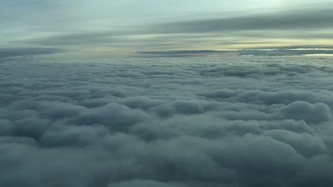 A Pilot’s View From a Jet Cockpit: Flying Over an Endless Blanket of Stratus Stock Footage 304510113
