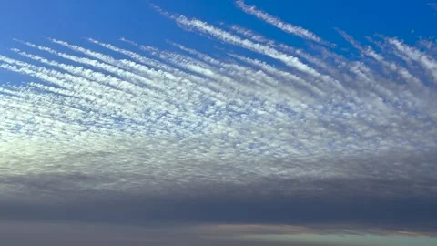 Pilot’s View of Parallel Altocumulus Cloud Bands from Airplane Cockpit Taken at Stock Footage 340335041