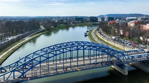 Pilsudski bridge on Vistula river, people running a marathon in Krakow, Poland Video stock 237368341
