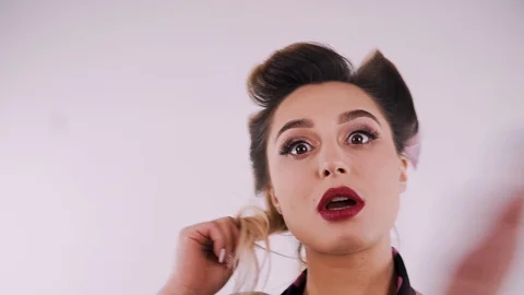 Pin-Up Girl Posing in Studio Stock Footage 124378091