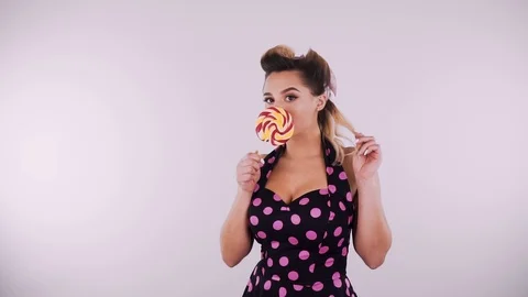 Pin-Up Girl Posing in Studio Stock Footage 124378205