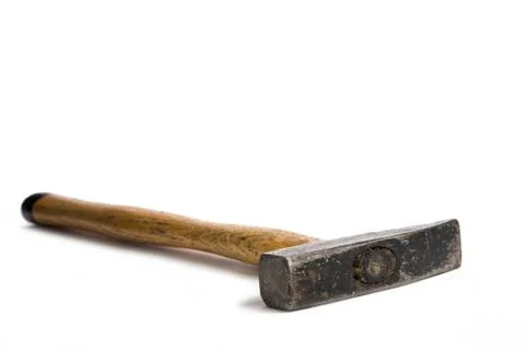 Pin hammer lying on white surface Stock Photos