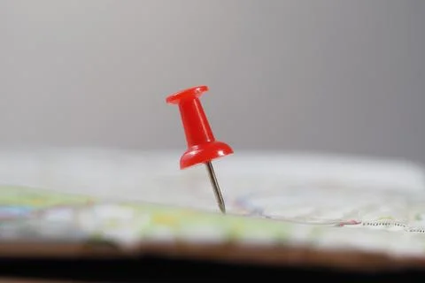 Pin marks location on a map in a simple setting Stock Photos