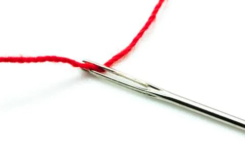 Pin with red thread 写真素材