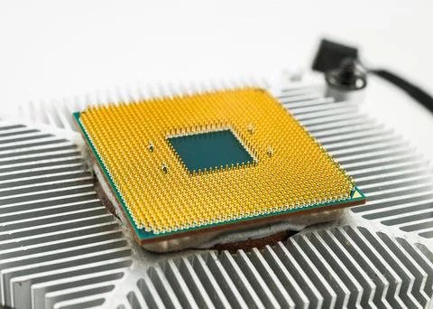 Pin side of a CPU processor mounted on a cooler 写真素材
