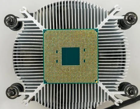 Pin side of a CPU processor mounted on a cooler Stock Photos