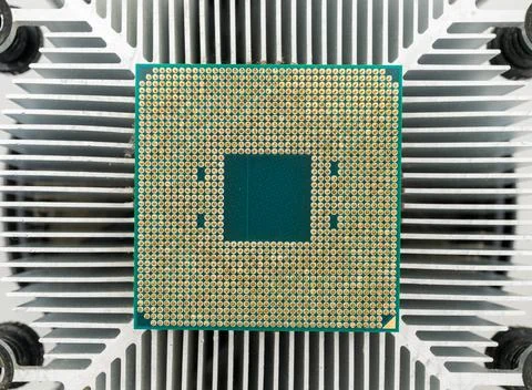 Pin side of a CPU processor mounted on a cooler 写真素材
