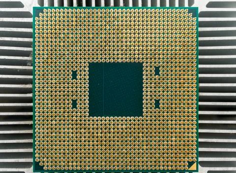 Pin side of a CPU processor mounted on a cooler 写真素材