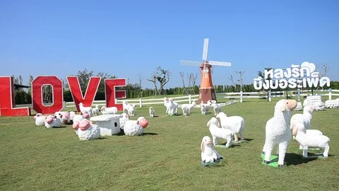 Pin wheel or windmill and decoration of gardening in public garden park Stock Footage 71294727