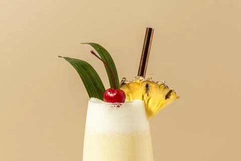Pina Colada with pineapple and cherry on top Stock Photos