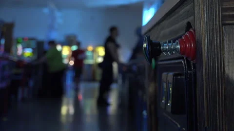 Pinball players at arcade in background of machine 4k Stock Footage 51776772