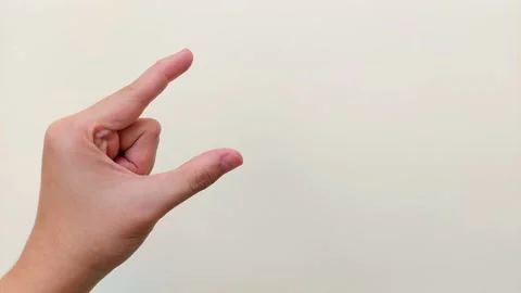 Pinching or Measuring Gesture Stock Footage 339078244