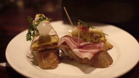 Pinchos of ham and omelet in a basque bar 動画素材 72411780