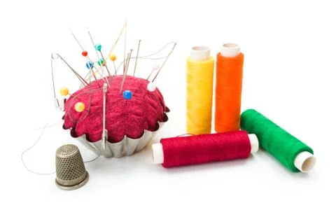 Pincushion, thimble and threads Stock Photos
