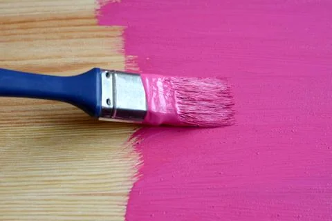 Pine board being painted Stock Photos