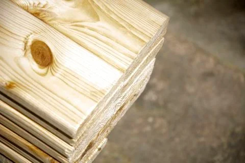Pine boards stacked in a hardware store. Construction material Stock Photos