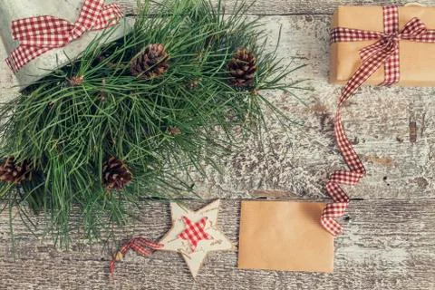 Pine branches and cones, craft gift and blank card top view of the effect i.. Stock Photos