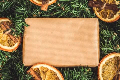 Pine branches, craft gift, dried oranges, cinnamon, instagram effect Stock Photos