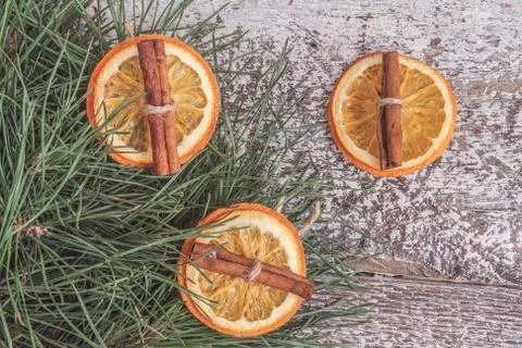 Pine branches, dried orange and cinnamon sticks instagram effect Stock Photos