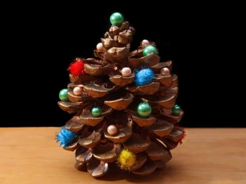 Pine cone with decorations Stock Photos